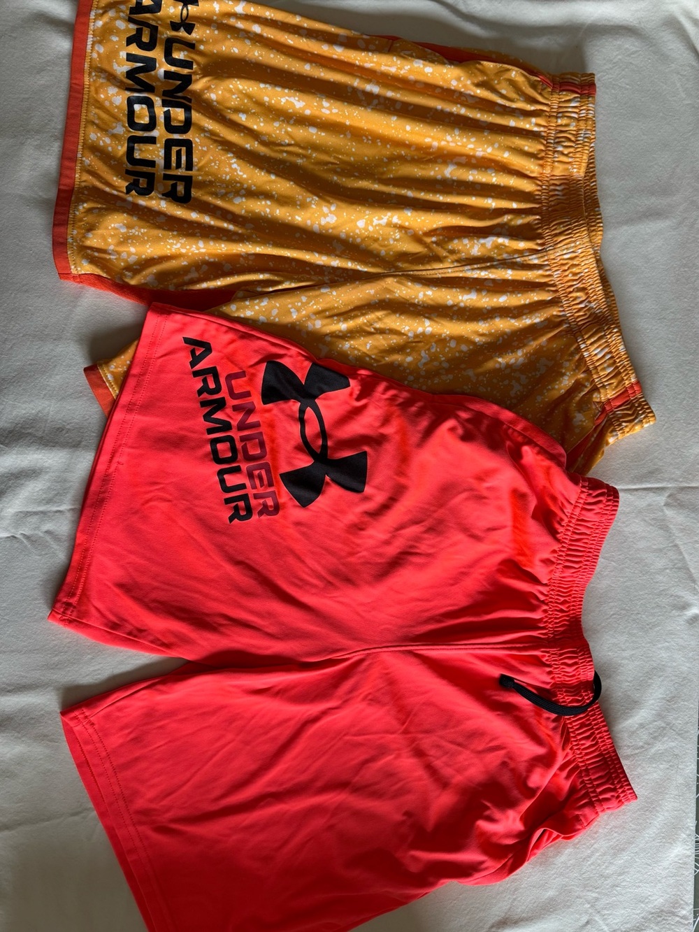 Boys YXL Under Armour Athletic shorts in Bright Orange, 2 pair